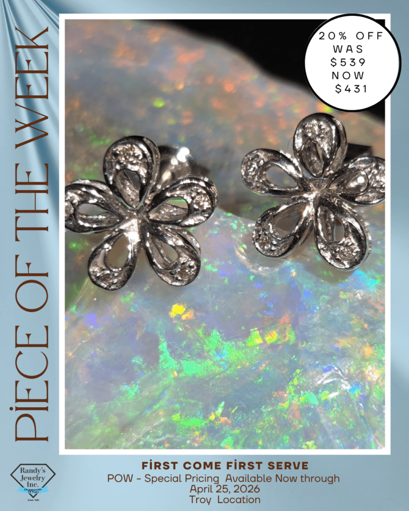 Promotional poster featuring two silver flower-shaped jewelry pieces on an iridescent background, with a 20% off badge.