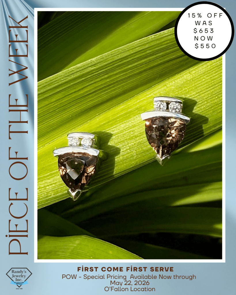 Close-up of two brown pear-cut diamond rings with diamond halos on a green leaf, bordered by a blue flyer with a '15% OFF' tag and the text 'FIRST COME FIRST SERVE' and store details.